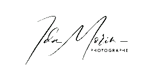 Le Forum du Rotary - Un logo minimaliste avec le nom manuscrit "Ida Morin" en écriture cursive, suivi de "PHOTOGRAPHE" en lettres majuscules sans empattement, évoque un retour en images sur un fond blanc net.